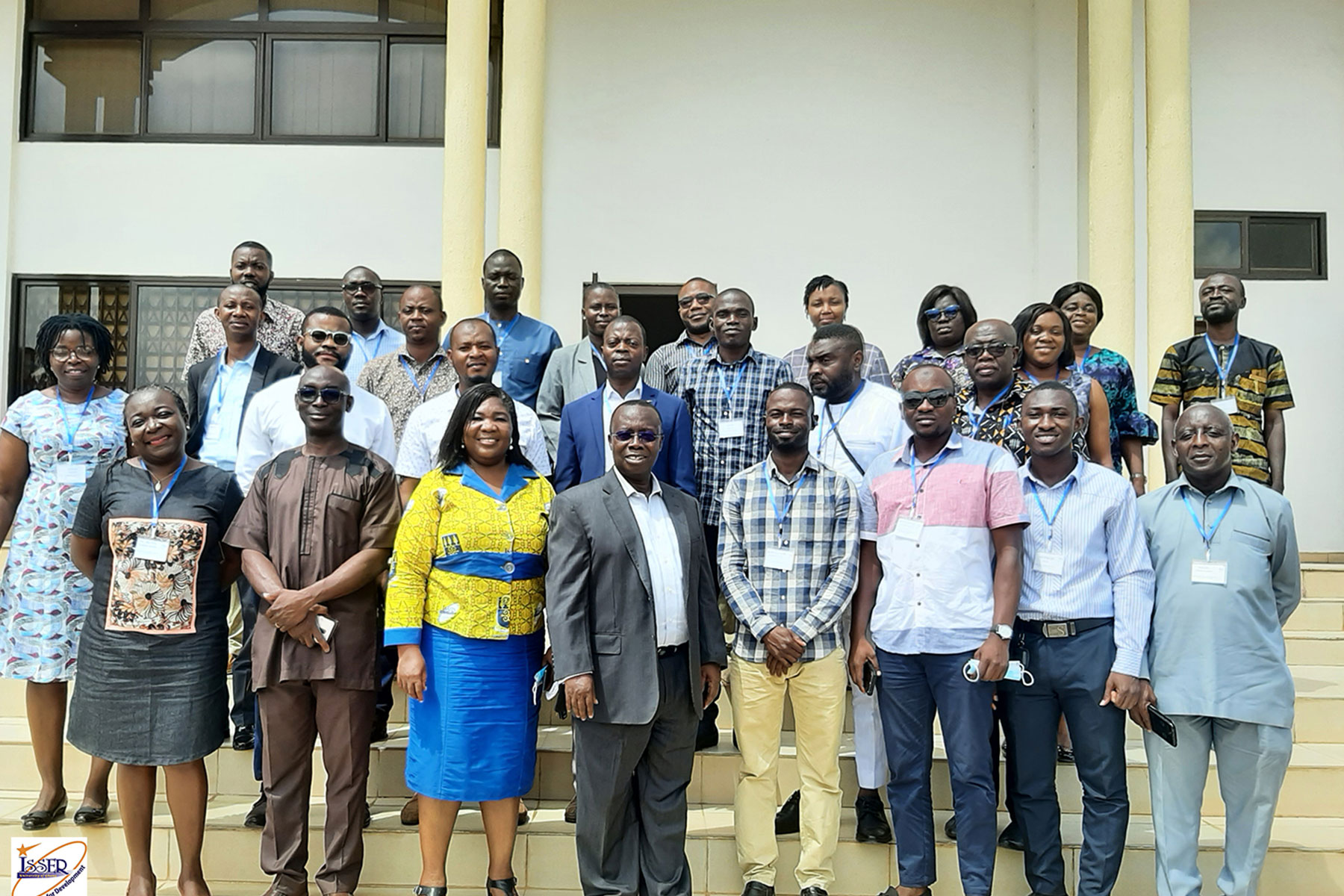 Dr. Addoquaye Tagoe and Dr. Ameyaw in a group photo with participants
